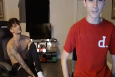 two young guys Caressing Their ramrods